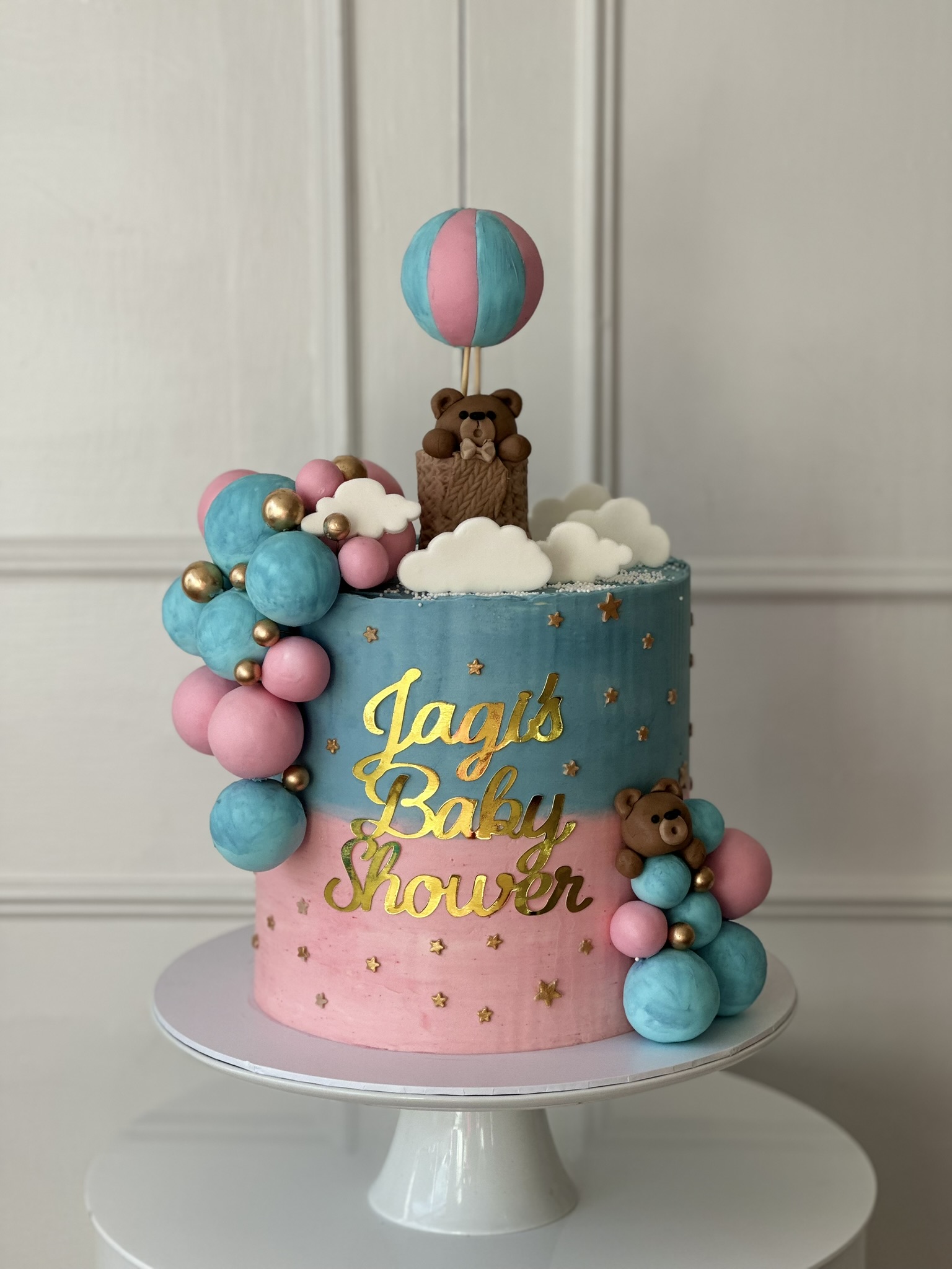 Jagi baby shower pink and blue hot air balloon cake