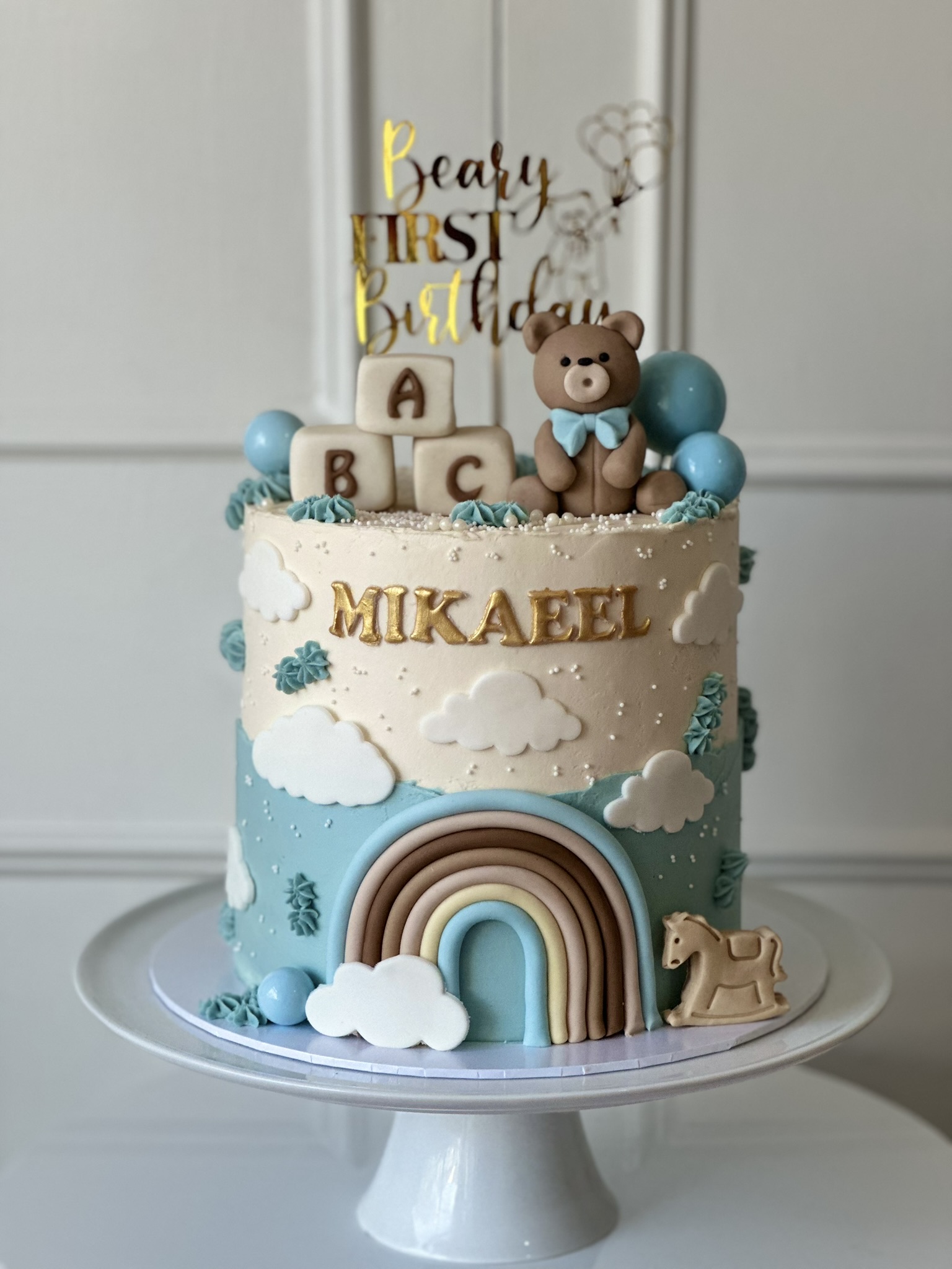 Mikaeel Beary First Birthday blue teddy bear cake