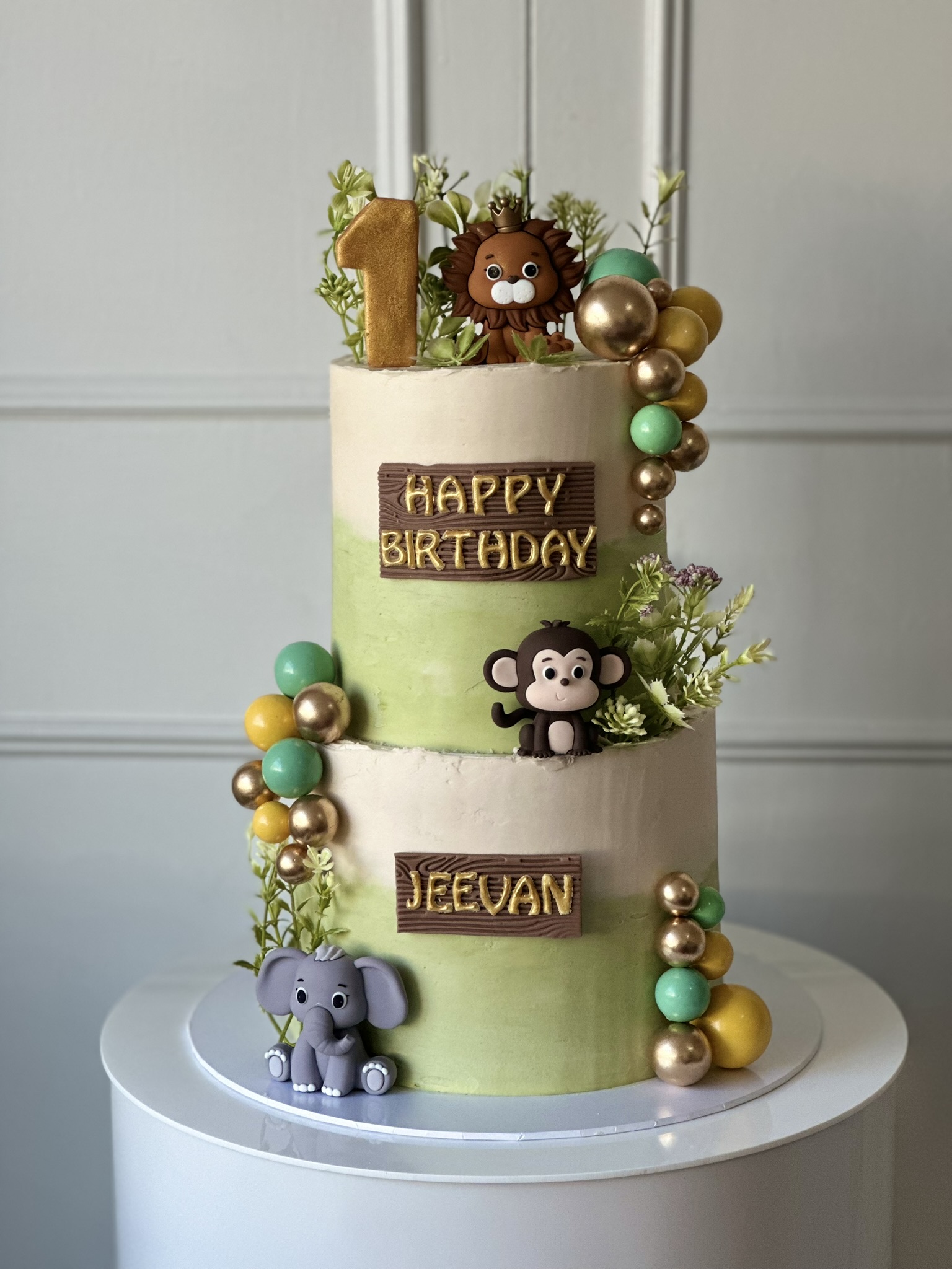 Jeevan 1st birthday jungle safari green cake