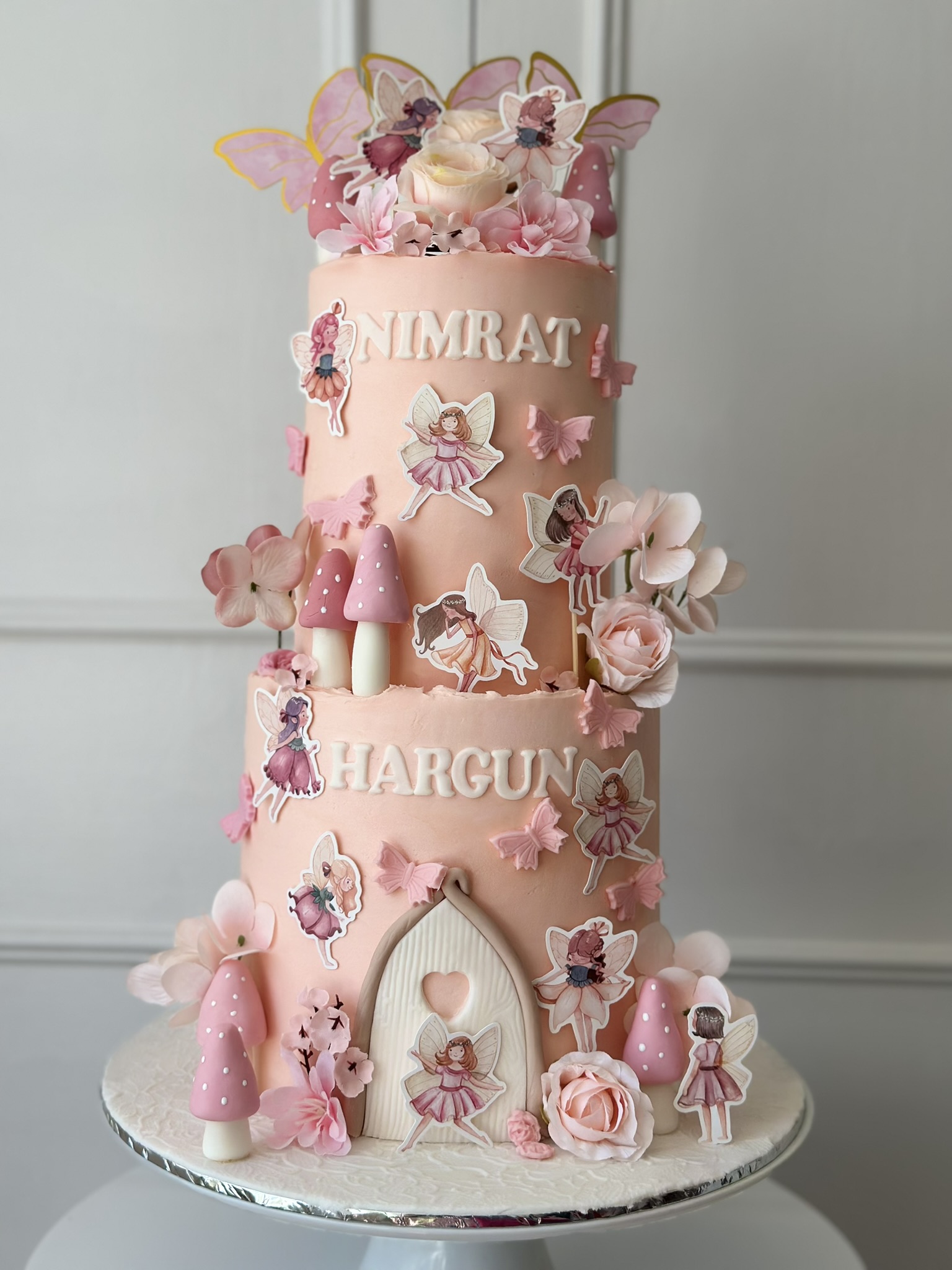 Nimrat and Hargun fairy garden 3 tier birthday cake