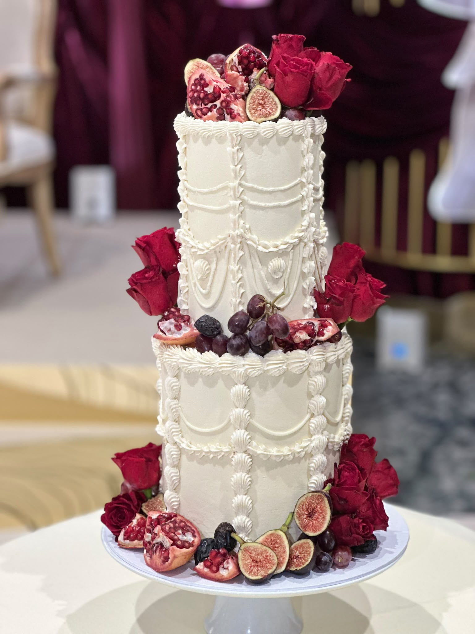 5 tier wedding cake with white roses
