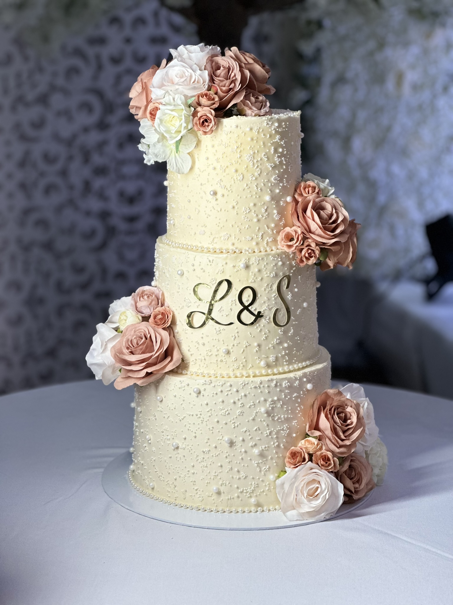 L&S 4 tier pearl wedding cake with blush roses