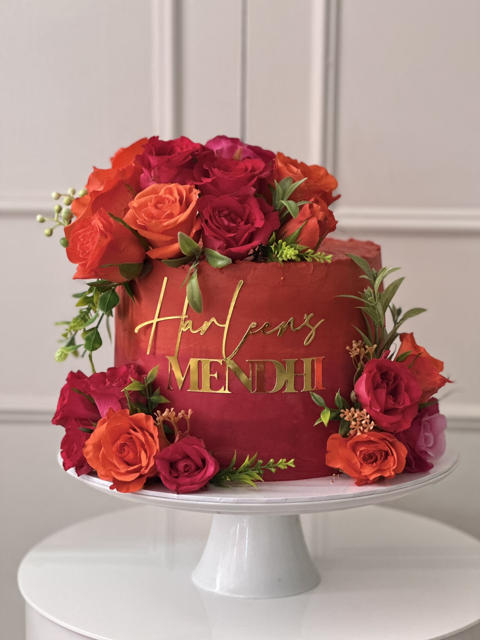 Harleenz Mendhi red floral cake